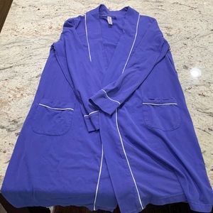 Used, purple/periwinkle with white trim, light-weight Children’s bathrobe, XS/S.